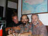 Wiley with Patrick, his surfing instructor, and Brian, owner of Naughty Nury's