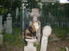 Cat on a headstone