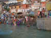 The devout immerse themselves in the waters of the Ganges